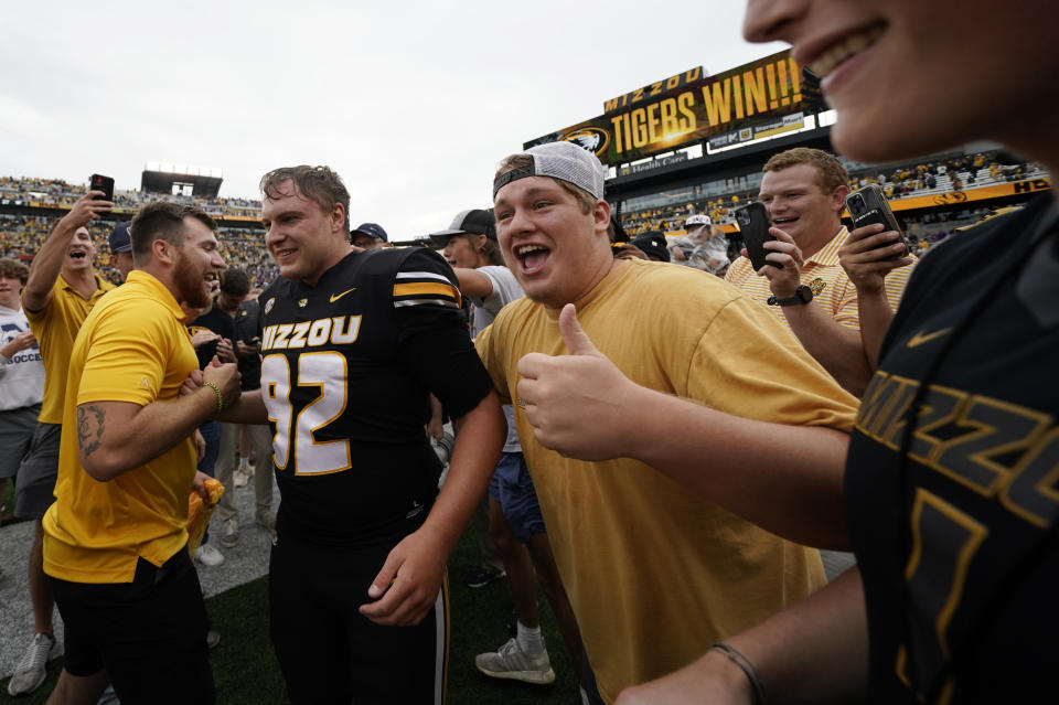 COLUMBIA, MISSOURI - SEPTEMBER 16:  Place kicker Harrison Mevis #92 of the Missouri Tigers Celebrates with fans after kicking the game-winning field goal against the Kansas State Wildcats in the first half at Faurot Field/Memorial Stadium on September 16, 2023 in Columbia, Missouri. (Photo by Ed Zurga/Getty Images)