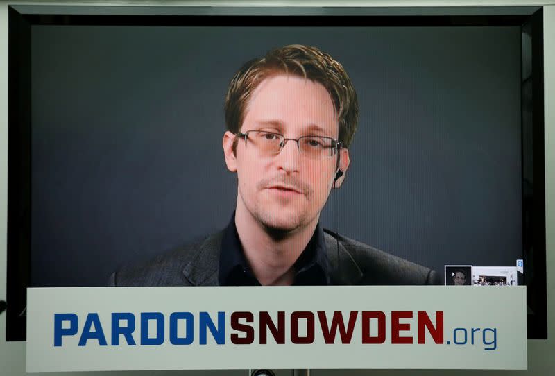 FILE PHOTO: Edward Snowden speaks via video link during a news conference in New York