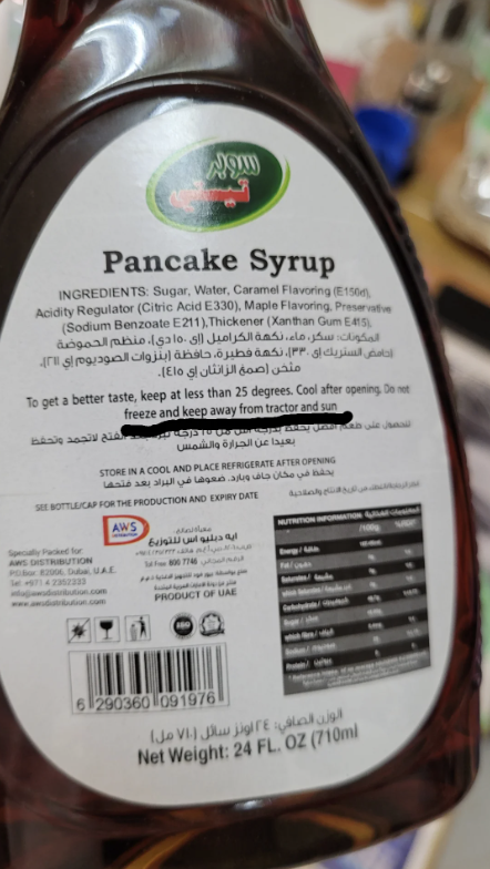 Label of a 24 fl oz pancake syrup bottle listing ingredients and storage instructions