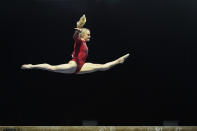 Riley McCusker performs on the balance beam during the Winter Cup gymnastics competition, Saturday, Feb. 27, 2021, in Indianapolis. (AP Photo/Darron Cummings)