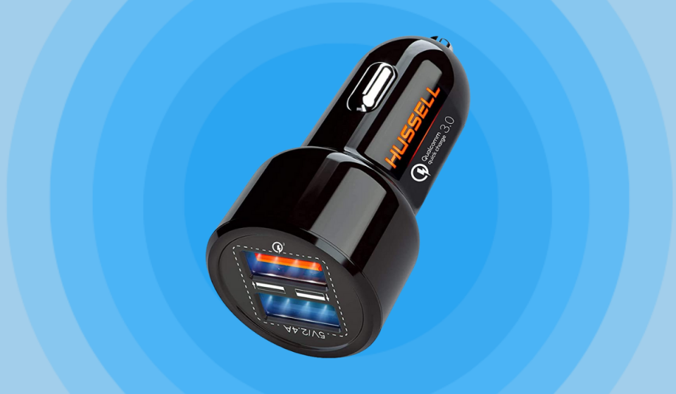 Hussell USB car charger over blue background