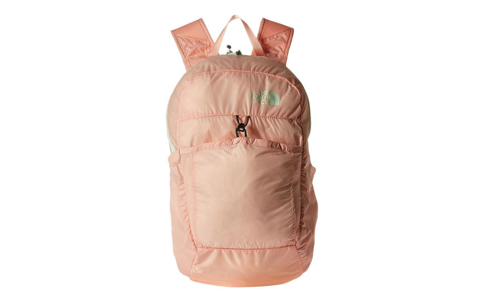 <p>Don’t let your backpack weigh you down! <a rel="nofollow noopener" href="http://www.anrdoezrs.net/links/7876402/type/dlg/sid/TL_WomensBackpacks_KFApr17/http://www.zappos.com/p/the-north-face-flyweight-pack-banff-blue-metallic-silver/product/8828646/color/670877" target="_blank" data-ylk="slk:This pack by The North Face;elm:context_link;itc:0;sec:content-canvas" class="link ">This pack by The North Face</a> only weighs 7 ounces and can even fold into an inside pocket when not in use.</p>