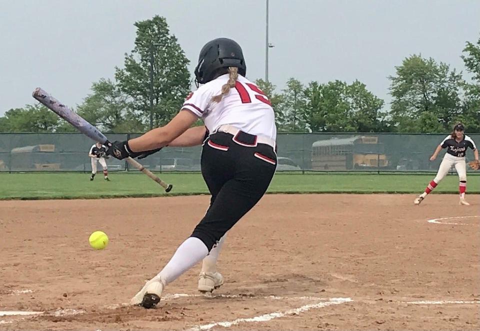Cardington's Mac Linkous lays down a bunt to lead off the bottom of the first inning during a Division III district championship softball game Friday night at Pickerington Central.