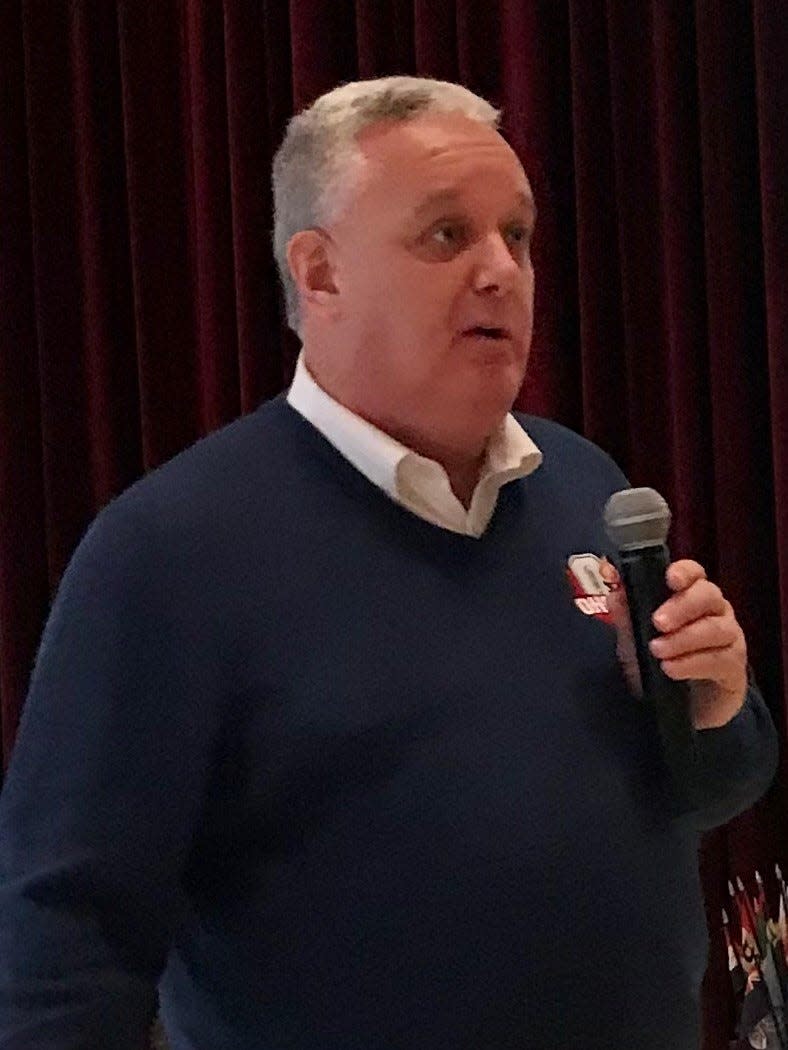 Ohio High School Athletic Association Executive Director speaks at a Rotary Club meeting in Marion over the winter, addressing several high school student leaders and officials.