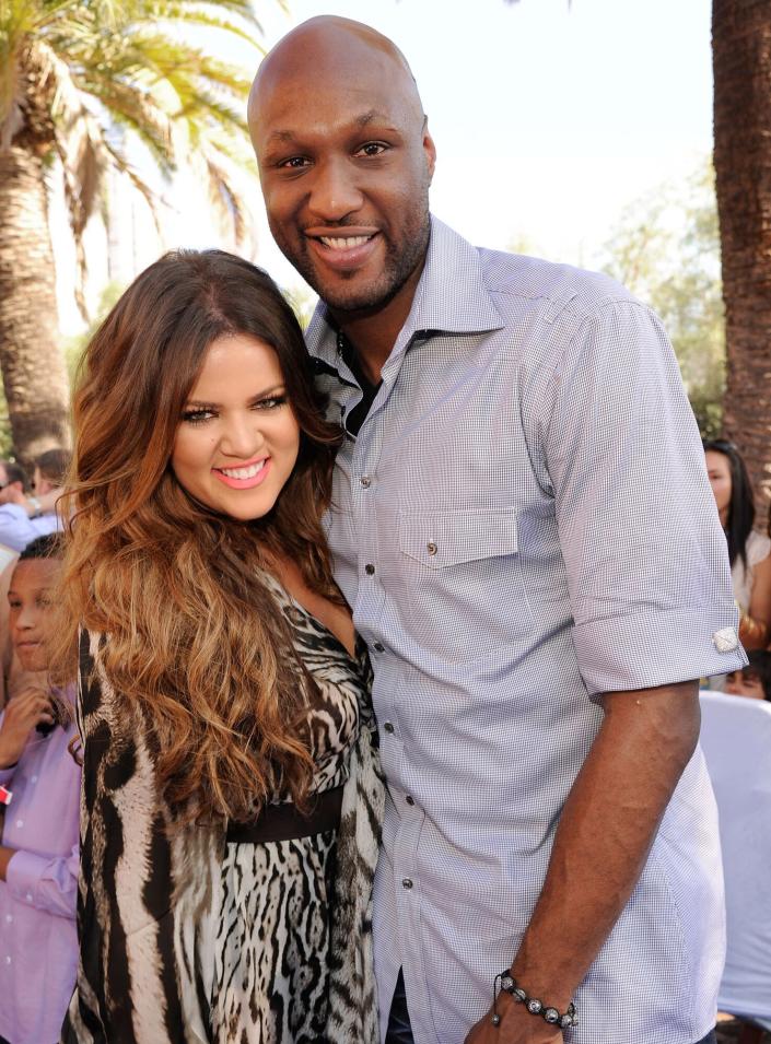 Khloe Kardashian and professional basketball player Lamar Odom arrive at the 2011 Teen Choice Awards held at the Gibson Amphitheater on August 7, 2011 in Universal City, California.