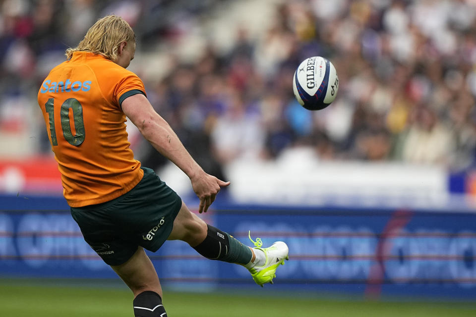 Australia's Carter Gordon kicks the ball during the International Rugby Union World Cup warm-up match between France and Australia at the Stade de France stadium in Saint Denis, outside Paris, Sunday, Aug. 27, 2023. (AP Photo/Michel Euler)