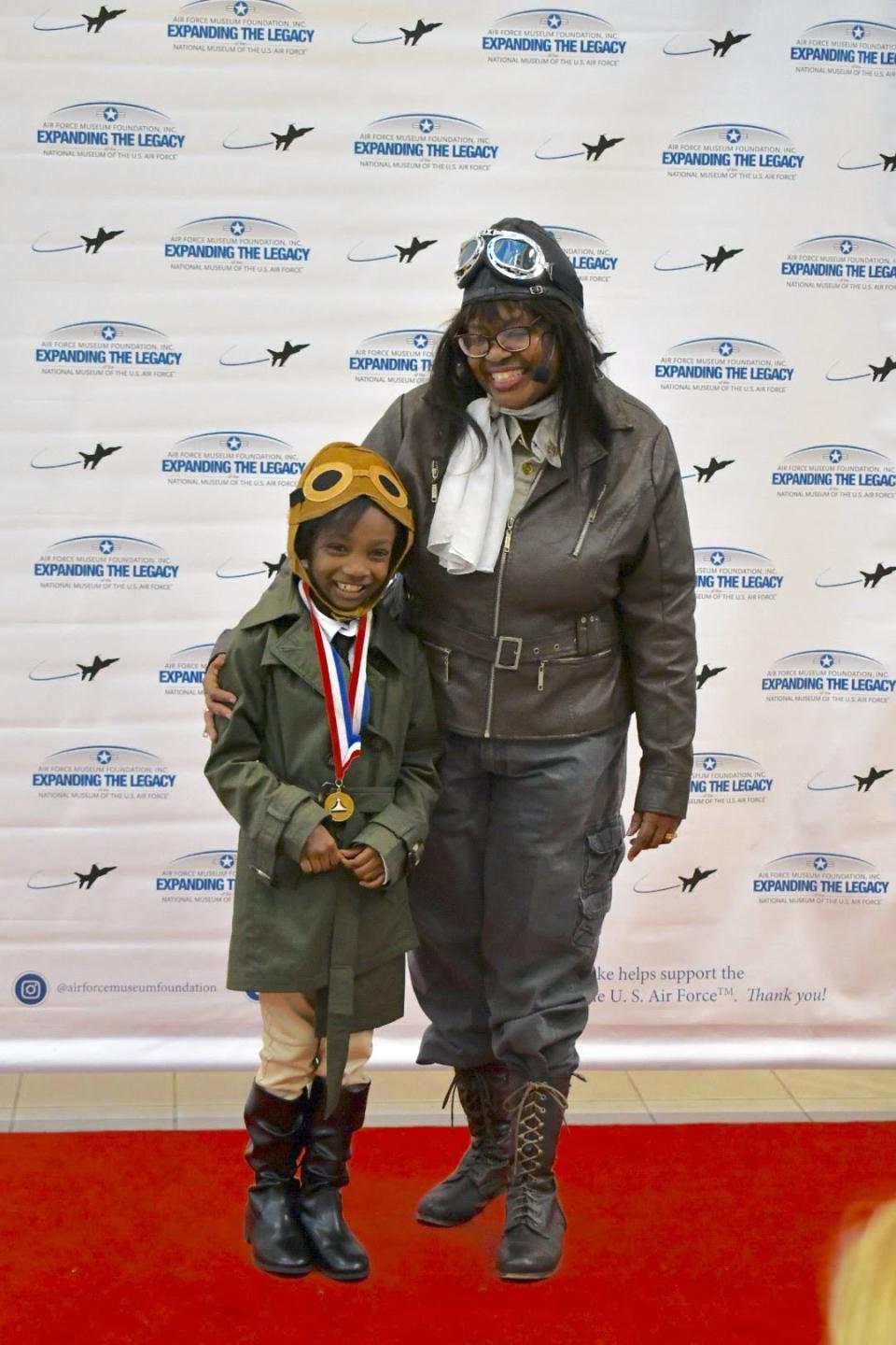 Noa Lewis poses with Gigi Coleman at the  Air Force Museum Foundation's Living History Series. (Credit: Moniqua Lewis)  