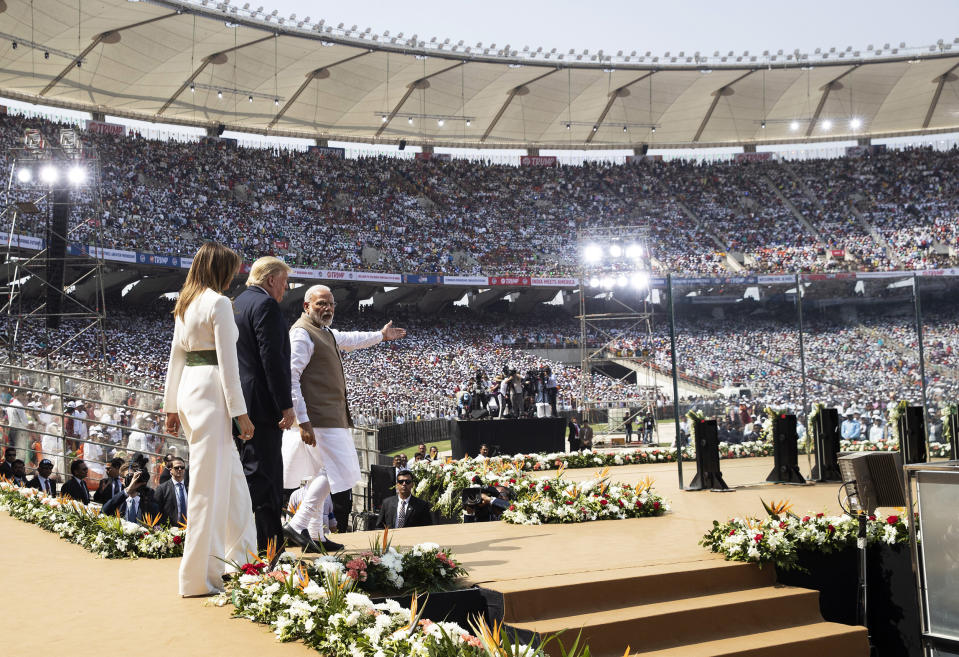 President Donald Trump, first lady Melania Trump, and Indian Prime Minister Narendra Modi arrive for a 