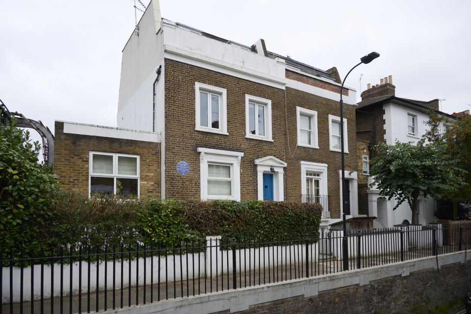 In this Sept. 30, 2021 photo provided by English Heritage a view of the blue plaque on the house where African American freedom fighters Ellen and William Craft settled and raised their family, in Hammersmith, London. English Heritage on Tuesday, Oct. 5, 2021 marked the accomplishments of Ellen and William Craft with a blue plaque outside the two-story brick row house in the Hammersmith area of West London from which they campaigned for the end of slavery. The couple escaped slavery in 1848 when Ellen, the light-skinned daughter of a Black woman raped by her enslaver, disguised herself as a disabled white man traveling north for medical treatment. William accompanied her, posing as her servant. (Justin Thomas/English Heritage via AP)