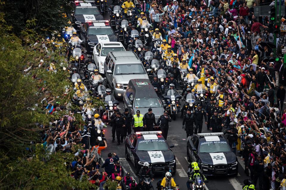 The funeral procession is seen during the transfer of the remains of Mexican singer Juan Gabriel.