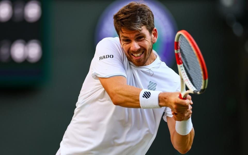 Cameron Norrie of Great Britain hits a backhand against David Goffin of Belgium in the quarter finals of the gentlemen's singles during day nine of The Championship - Photo by Frey/TPN/Getty Images