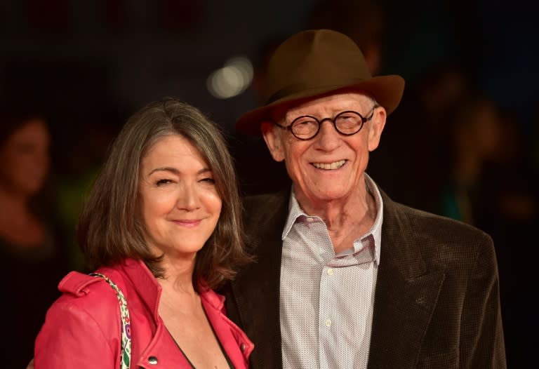 John Hurt (R) and his wife Anwen Rees-Myers pose on arrival for the premiere of 'Suffragette' at the London Film Festival in 2015