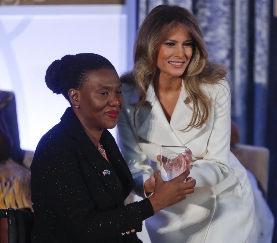 First lady Melania Trump presents the 2017 Secretary's of State's International Women of Courage (IWOC) Award to Malebogo Molefhe, from Botswana, Wednesday, March 29, 2017, at the State Department in Washington. (AP Photo/Pablo Martinez Monsivais)