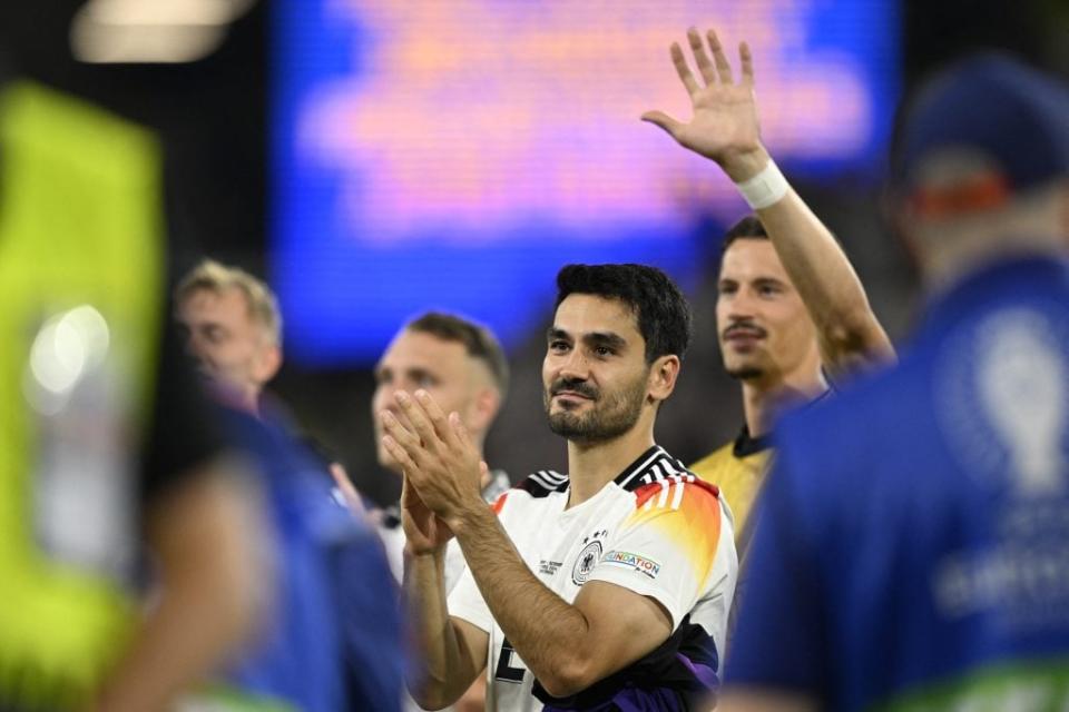 Germany’s midfielder #21 Ilkay Gundogan applauds the fans at the end of the UEFA Euro 2024 round of 16 football match between Germany and Denmark at the BVB Stadion Dortmund in Dortmund on June 29, 2024. (Photo by INA FASSBENDER / AFP) (Photo by INA FASSBENDER/AFP via Getty Images)