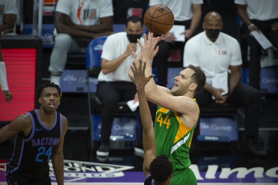 Utah Jazz forward Bojan Bogdanovic (44) shoots against the Sacramento Kings during the second half of an NBA basketball game in Sacramento, Calif., Sunday, May 16, 2021. The Jazz won 121-99. (AP Photo/Randall Benton)