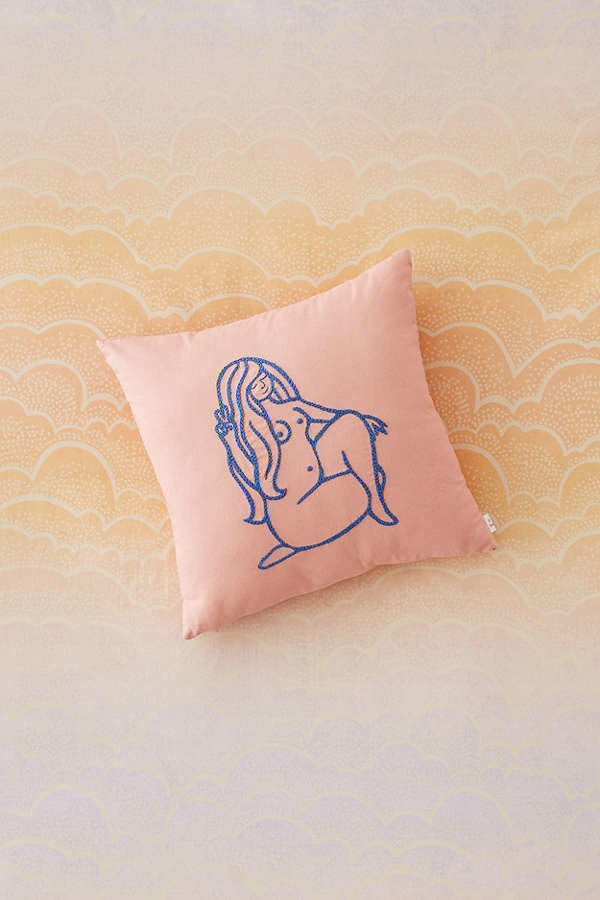 Get it <a href="https://www.urbanoutfitters.com/shop/the-lady-throw-pillow?category=decorative-pillows-throw-blankets&amp;color=066" target="_blank">here</a>.&nbsp;