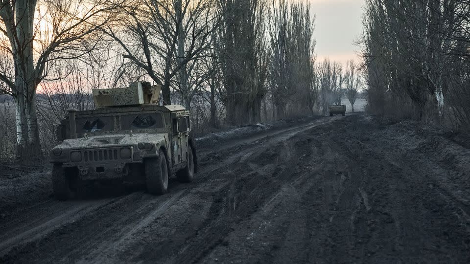 Vehicles are seen on the outskirts of Avdiivka on February 14, 2024. - Kostiantyn Liberov/Libkos/Getty Images