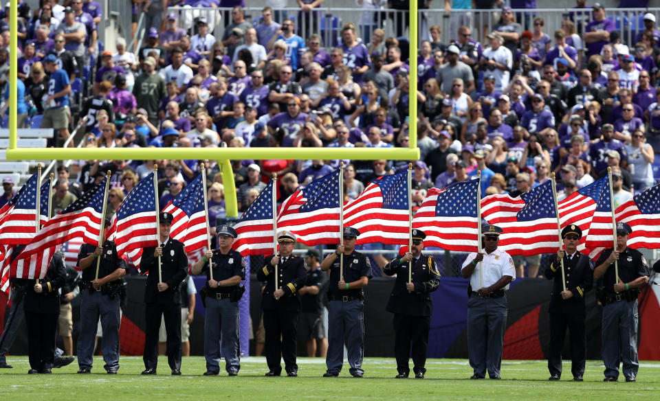 <p>First Responders carry flags prior to the Buffalo Bills vs. the Baltimore Ravens game at M&T Bank Stadium on September 11, 2016 in Baltimore, Maryland. (Photo by Patrick Smith/Getty Images) </p>