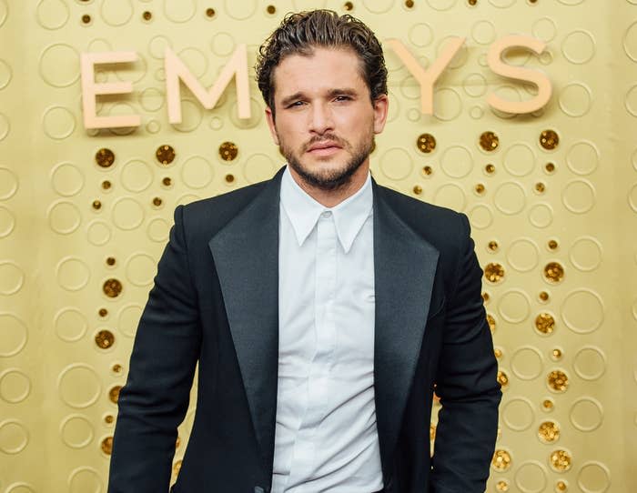 Kit wears a suit while attending the Emmys