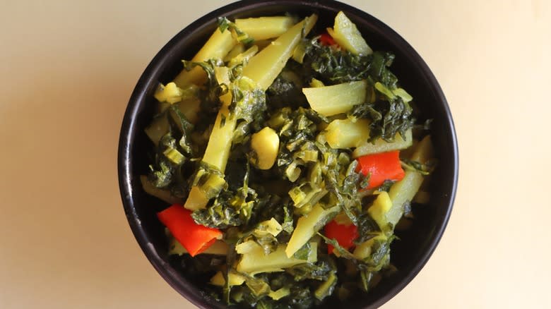 bowl mustard greens red peppers