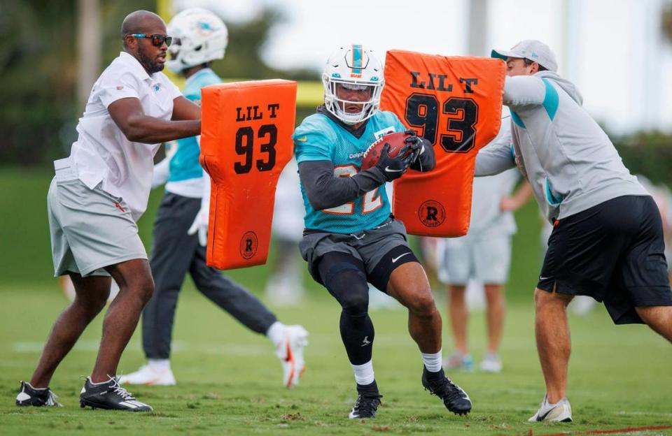 Miami Dolphins safety Elijah Campbell (22) runs with the football during NFL football training camp at Baptist Health Training Complex in Hard Rock Stadium on Monday, September 5, 2022 in Miami Gardens, Florida.