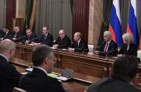 Russian President Vladimir Putin and Prime Minister Mikhail Mishustin meet with members of the new government in Moscow