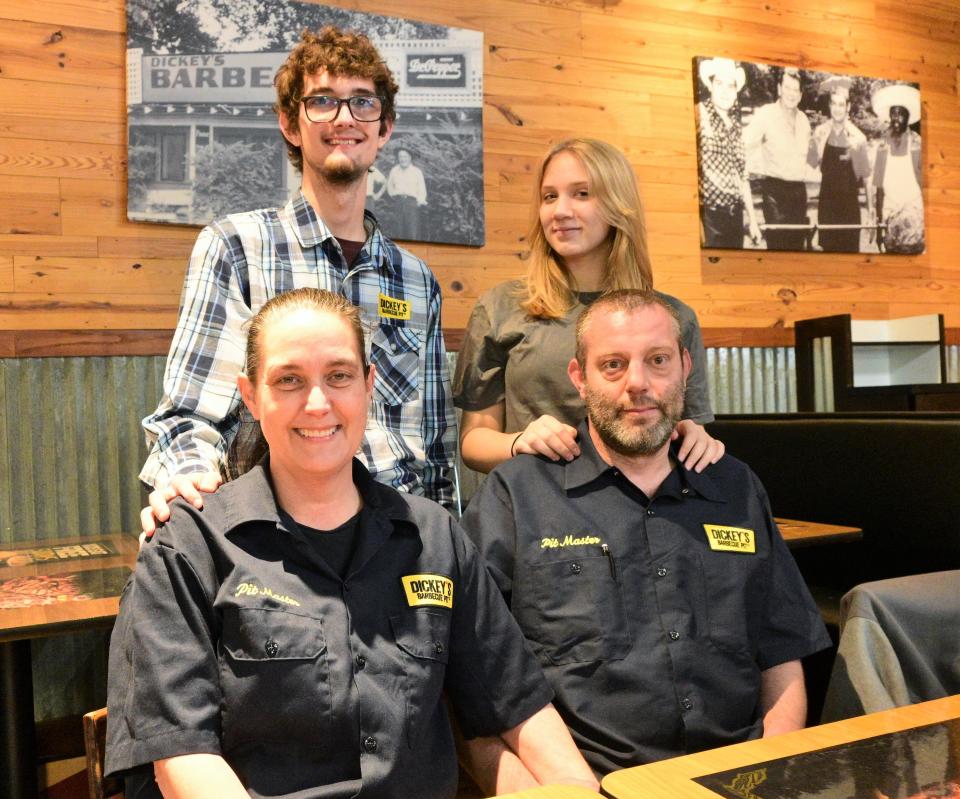 Vanessa Ingersoll and son Nicolas, Troy Cook and daughter Cecelia will reopen Dickey's Barbecue Pit at 445  E. Chicago Monday.