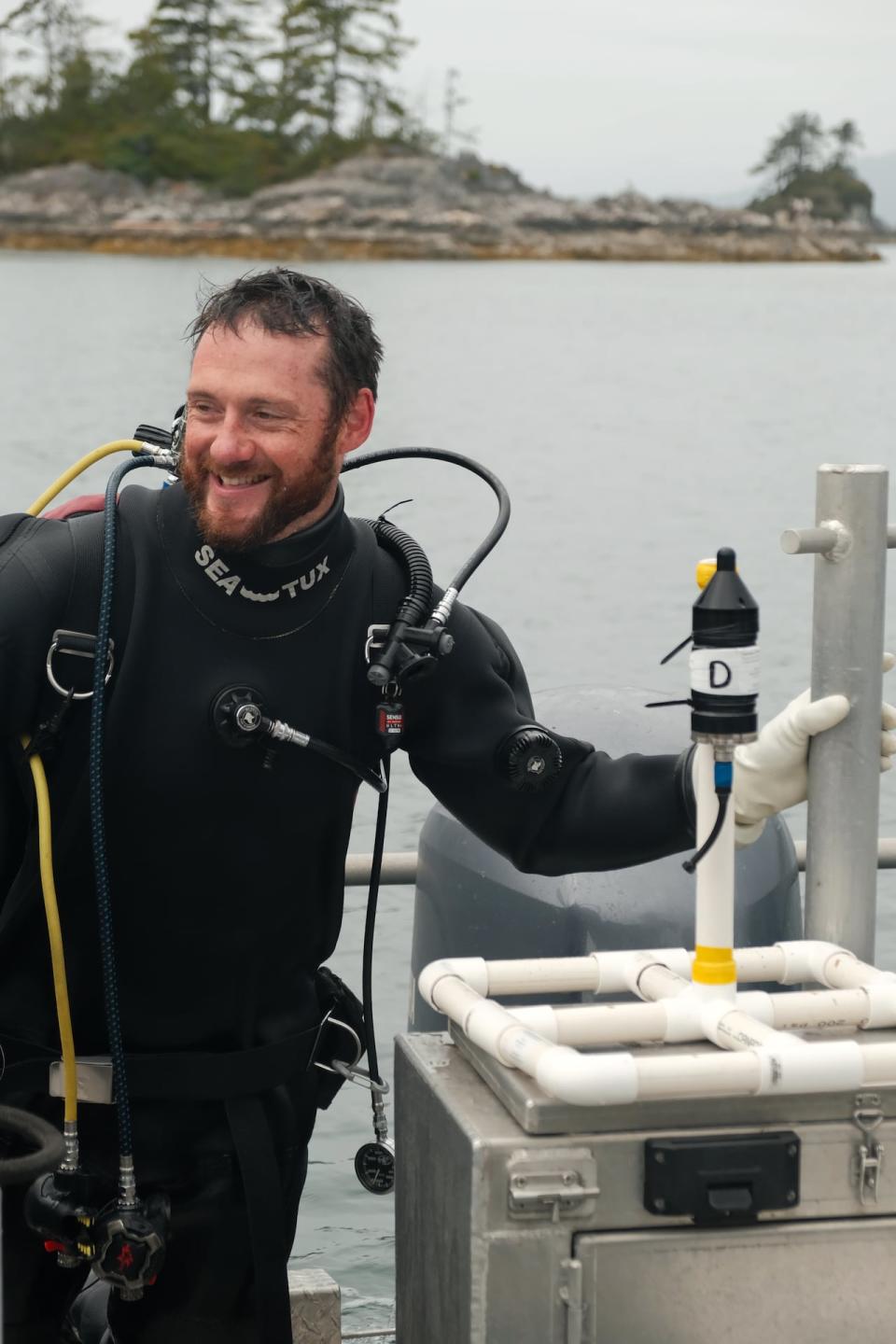 Kieran Cox, Liber Ero and NSERC Fellow from Simon Fraser University recovers a hydrophone that was deployed on a kelp forest to study the effects of noise from vessels on aquatic life near the Bamfield Marine Science Centre in Barkley Sounds, B.C.