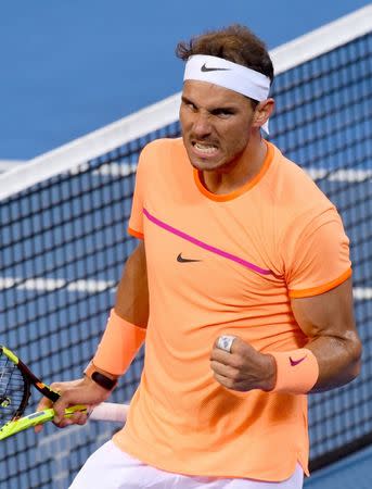 Tennis - Brisbane International - Pat Rafter Arena, Brisbane, Australia - 6/1/17 - Spain's Rafael Nadal reacts during his match against Canada's Milos Raonic. REUTERS/Steve Holland