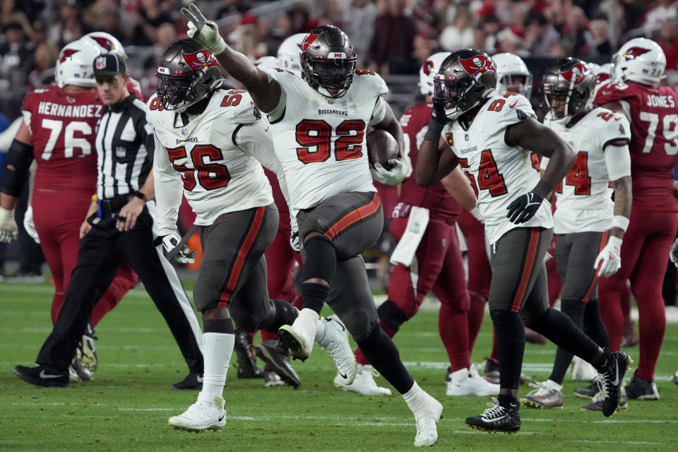 Tampa Bay Buccaneers defensive end William Gholston (92) celebrates his fumble recovery against the Arizona Cardinals during the second half of an NFL football game, Sunday, Dec. 25, 2022, in Glendale, Ariz. (AP Photo/Rick Scuteri)