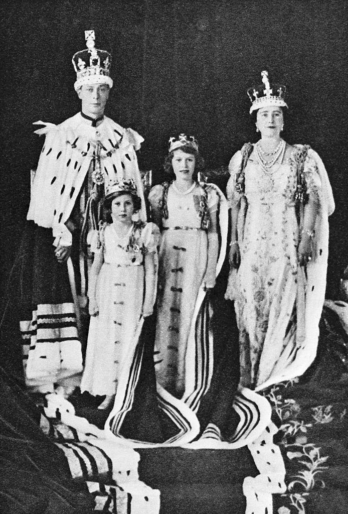 <p>After his brother abdicates the throne, the Duke of York becomes King George VI. Here, we see His Royal Highness with Queen Elizabeth and Princesses Elizabeth and Margaret on Coronation Day.</p>