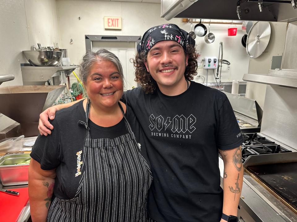 SoMe Brewing Company's new executive chef, Cam Pappas, in the brewery's newly remodeled kitchen with his staff - his mother Michele Pappas. The brewery and Pappas have partnered to debut a menu of sandwiches and cheesesteaks.