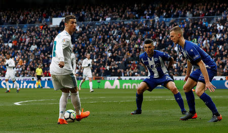 Soccer Football - La Liga Santander - Real Madrid vs Deportivo Alaves - Santiago Bernabeu, Madrid, Spain - February 24, 2018 Real Madrid’s Cristiano Ronaldo in action REUTERS/Juan Medina