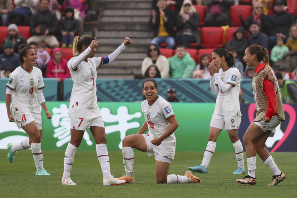 Morocco players celebrate following the Women's World Cup Group H soccer match between South Korea and Morocco in Adelaide, Australia, Sunday, July 30, 2023. (AP Photo/James Elsby)