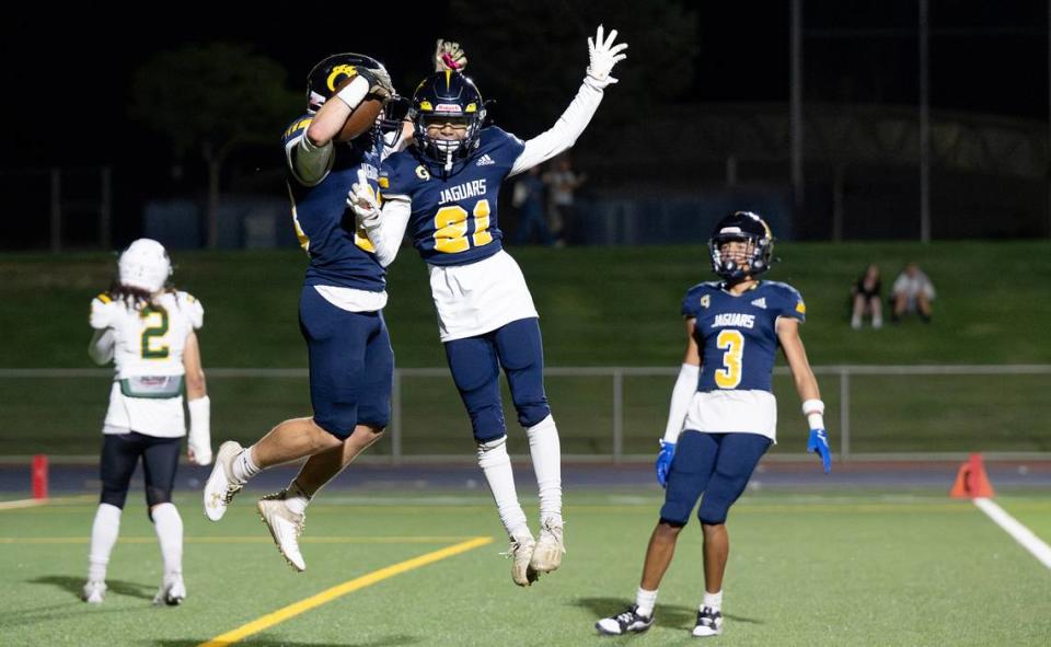 Gregori’s Michael Marsden and teammate Kaeden Chanthamany celebrate a touchdown during the nonleague game with Livermore at Gregori High School in Modesto, Calif., Friday, September 8, 2023. Gregori won the game 41-17.