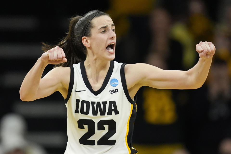 FILE - Iowa guard Caitlin Clark reacts during a second-round college basketball game against West Virginia in the NCAA Tournament, Monday, March 25, 2024, in Iowa City, Iowa. As Clark has become the face of women's basketball, her face is everywhere. She has lucrative NIL deals with Nike, Gatorade, Buick and was featured in a State Farm commercial with Jimmy Butler and Reggie Miller. (AP Photo/Charlie Neibergall, File)