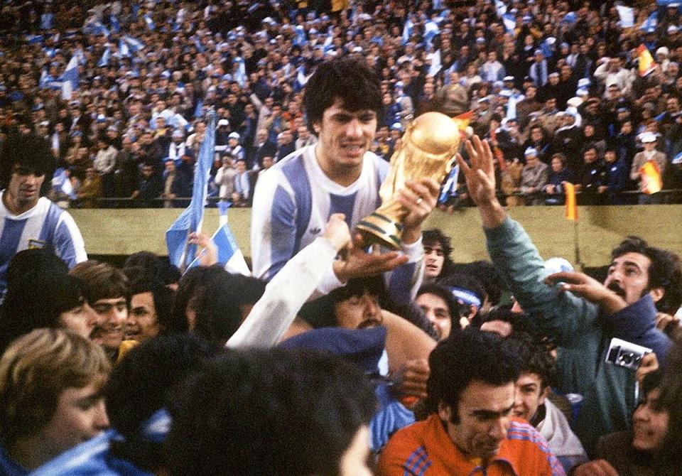 Argentina captain Daniel Passarella celebrates with the World Cup trophy (AFP via Getty Images)