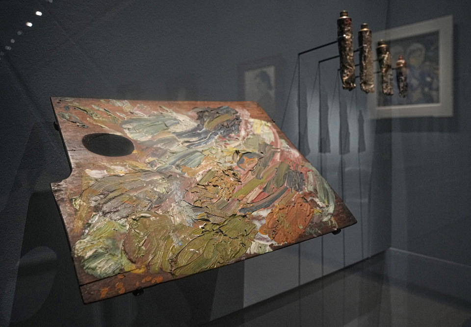 The painting palette used by Vincent Van Gogh for the painting "Marguerite Gachet at the Piano", 1890, is displayed at the "Van Gogh in Auvers-sur-Oise: The Final Months" exhibition at the Musee d'Orsay in Paris, Friday, Sept. 29, 2023. The exhibition opens for the public from Oct. 3, 2023 to Feb. 4, 2024. The new Van Gogh exhibition concentrated on the two months before his death at age 37 on July 29, 1890, is both extraordinary and extraordinarily painful — because this brief period was one of the artist's most productive but was also his last. (AP Photo/Michel Euler)