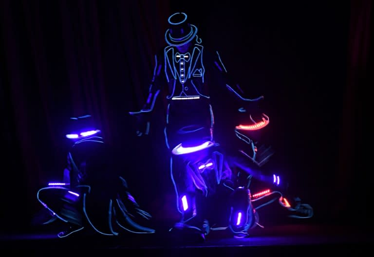 People dance onstage at CinemaCon 2017 on March 30, 2017 in Las Vegas, Nevada