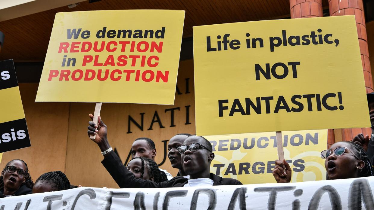 Green campaigners organized by the "BreakFreeFromPlastic movement" march through the streets in Nairobi, Kenya, Nov. 11, 2023.