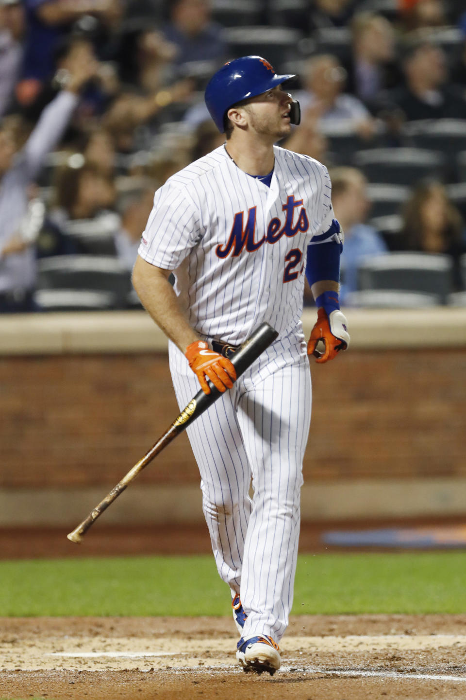 New York Mets' Pete Alonso watches his three-run home run in the second inning of the team's baseball game against the Miami Marlins, Wednesday, Sept. 25, 2019, in New York. (AP Photo/Kathy Willens)