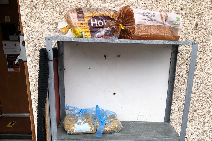 shelf with two loaves of bread