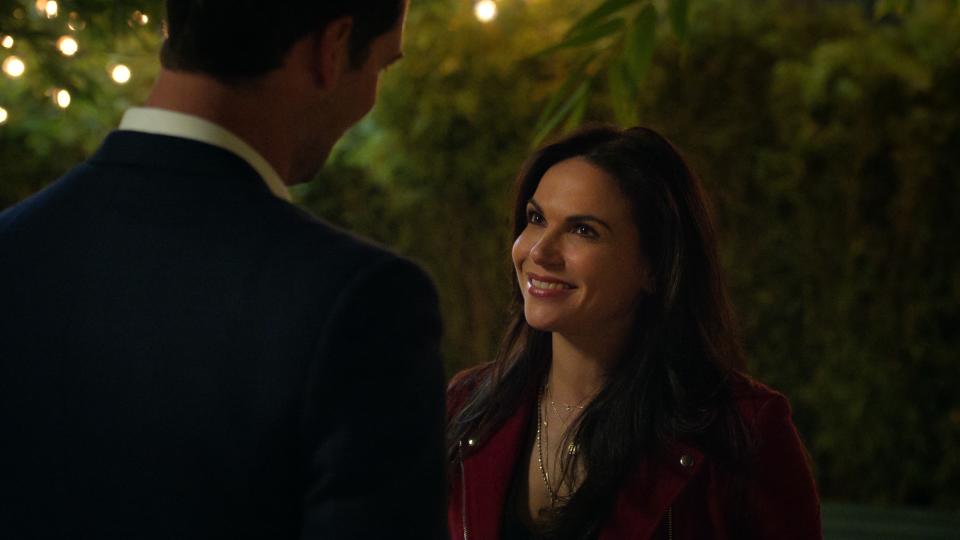 Lana Parrilla as Lisa smiling in The Lincoln Lawyer season 2