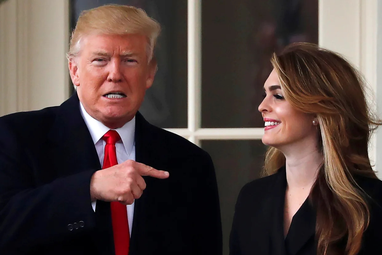 Former President Donald Trump standing next to former White House Communications Director Hope Hicks.