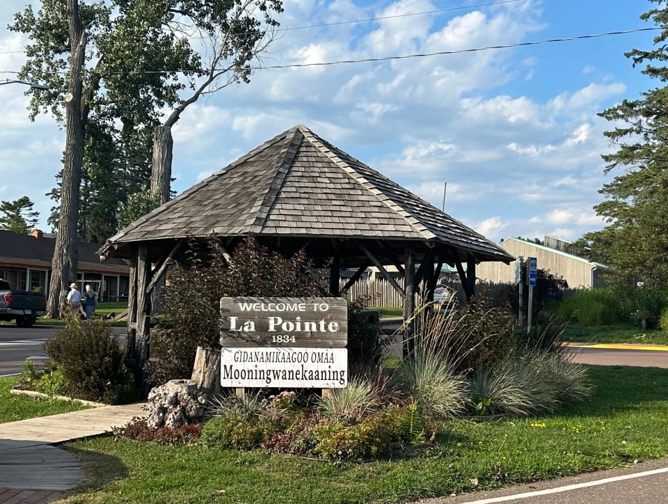 La Pointe welcomes visitors to Madeline Island with a sign that reads "Gidanamikaagoo omaa Mooningwanekaaning" (“Welcome to Madeline Island” in Ojibwe).