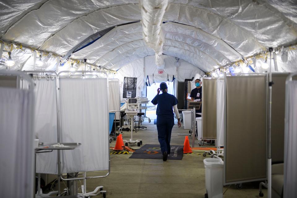 A Covid-19 patient triage area set up in a field hospital tent outside the emergency department of Martin Luther King Jr. (MLK) Community Hospital in Los Angeles. Source: Getty