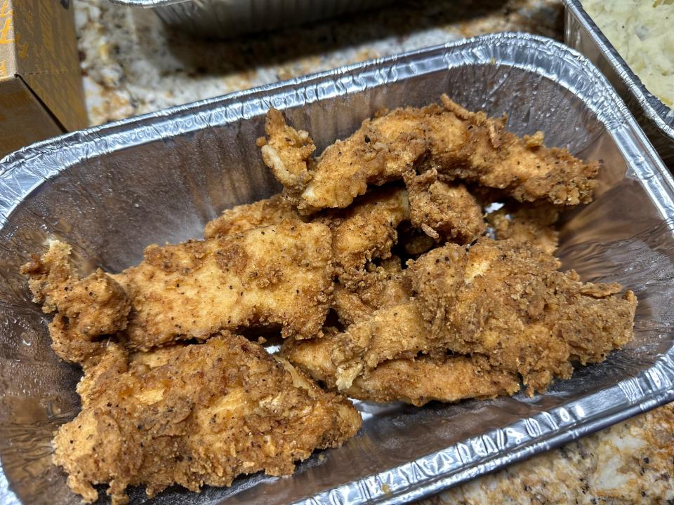 Fried chicken in foil tray 