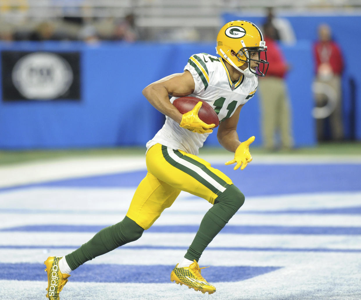 Green Bay Packers wide receiver Trevor Davis returns a kickoff against the Detroit Lions last season. Davis was arrested and released at LAX on Sunday. (AP)