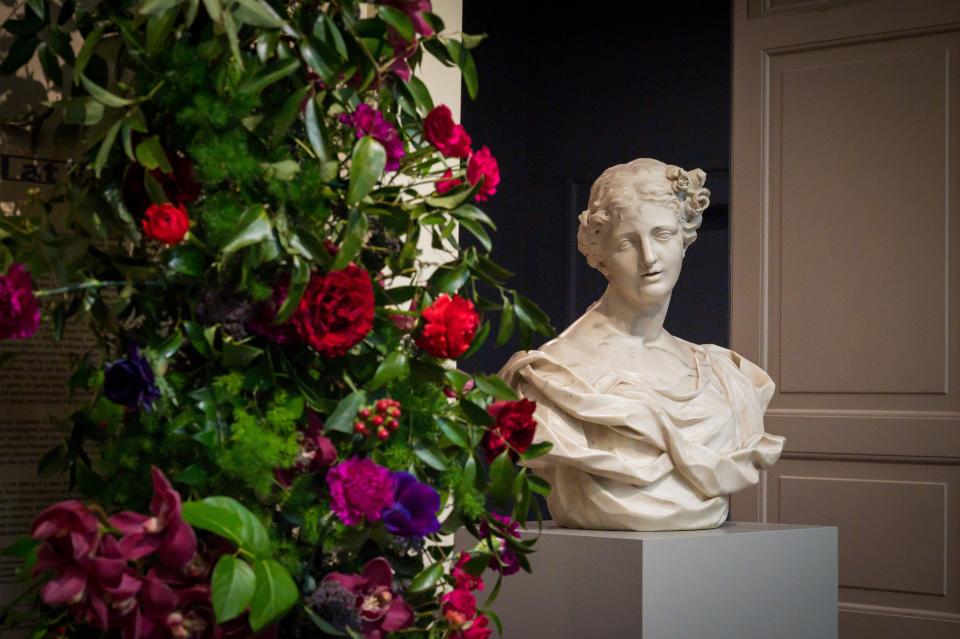 At Flora in Winter, works of art are reimagined and reinterpreted by some of the area's most talented florists. Here, an arrangement is inspired by the statue, "Flora," by Filippo Parodi.
