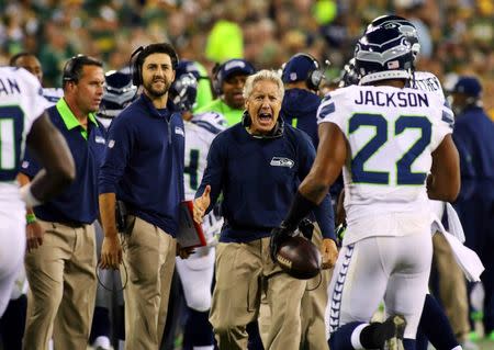 Seattle Seahawks head coach Pete Carroll reacts to a touchdown by running back Fred Jackson (22) against the Green Bay Packers during the second half at Lambeau Field. Sep 20, 2015; Green Bay, WI, USA. Ray Carlin-USA TODAY Sports